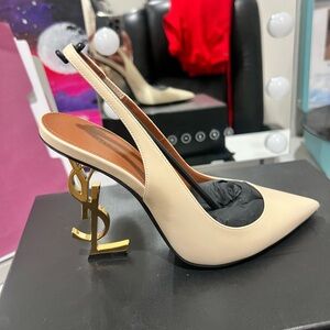 Lightly worn YSL heels size 37 fits like a 6